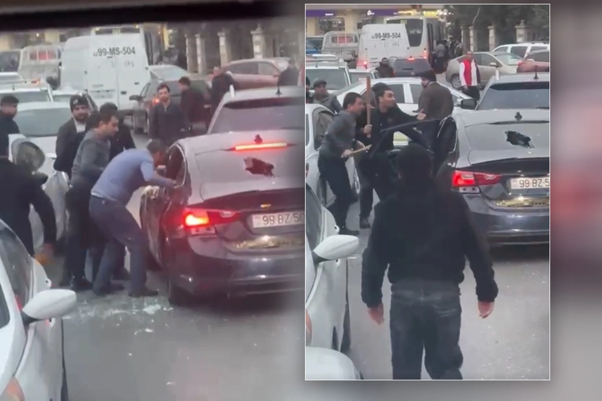 В Баку группа лиц напала с палками на автомобиль и избила находившихся в нем людей