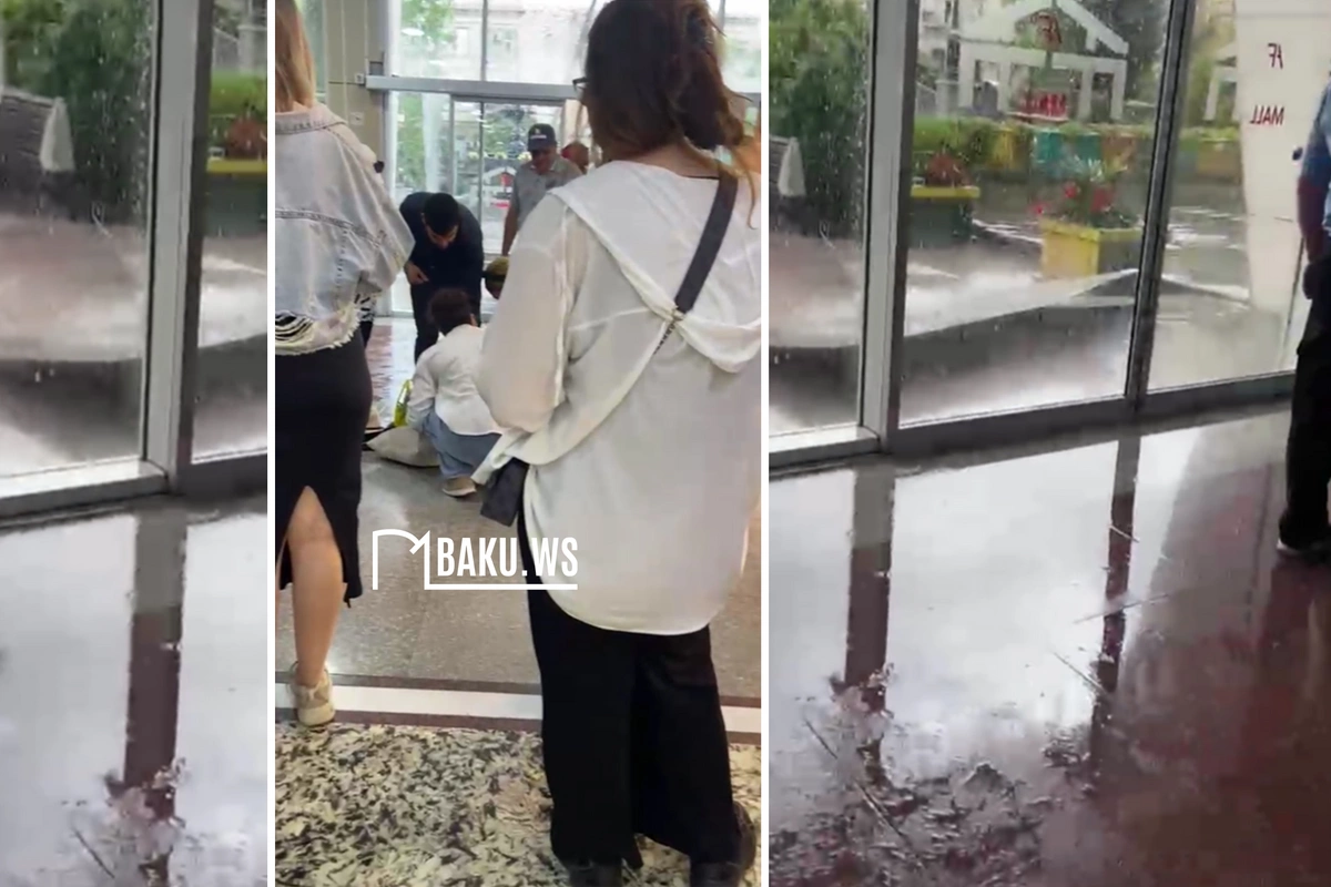 в Баку сильный град обрушил облицовку AF Mall на женщину